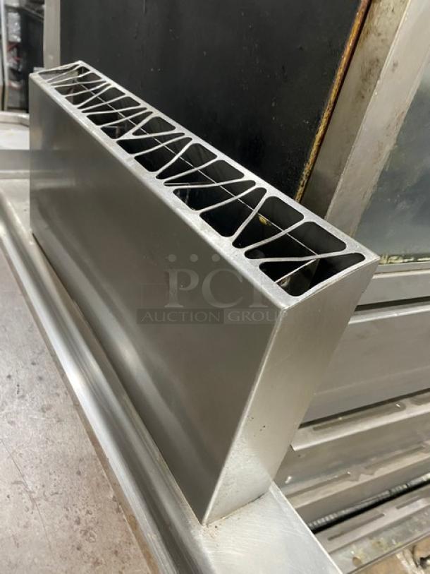 Electrolux Thermaline stainless steel flat top grill with enclosed open base, natural gas powered, commercial use.