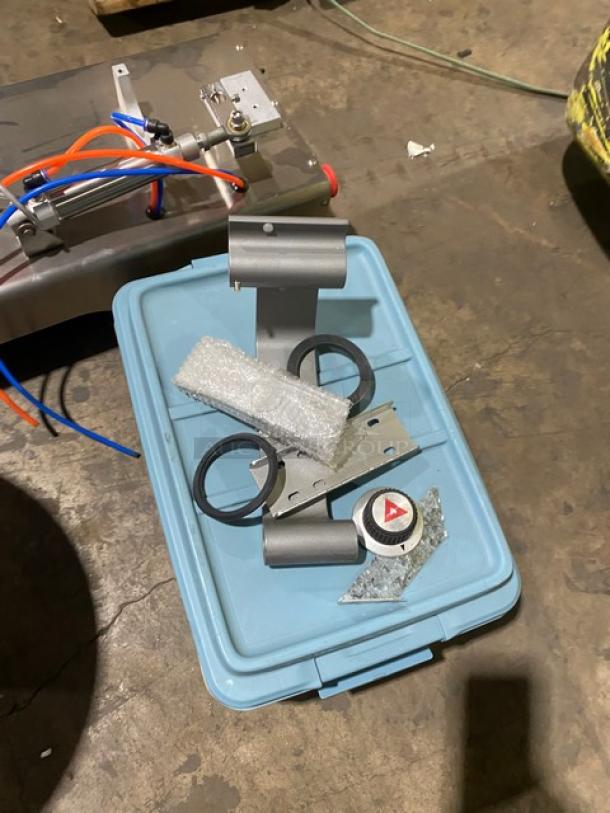 Vevor electric liquid filling machine with stainless steel hopper, pneumatic system, and mixed attachments on a blue box.
