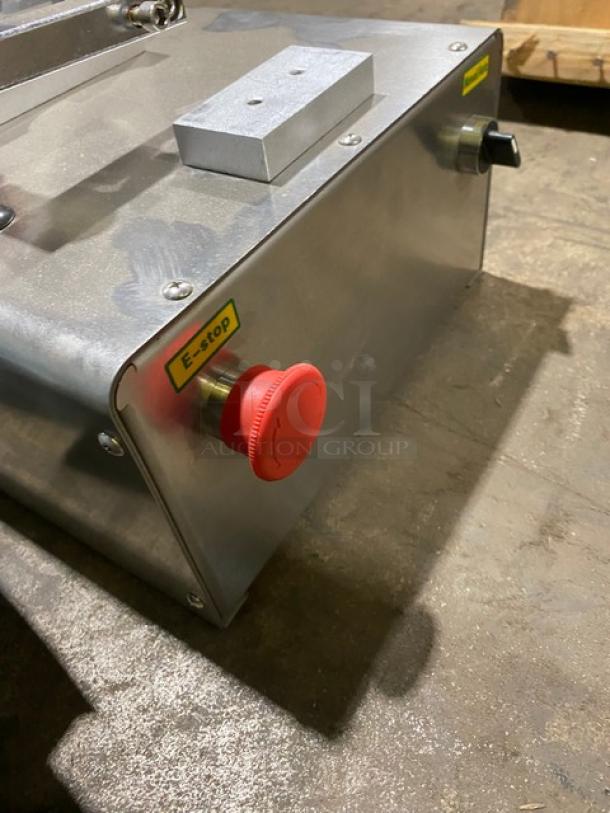 Vevor electric liquid filling machine with stainless steel body, red emergency stop button, and functional controls.
