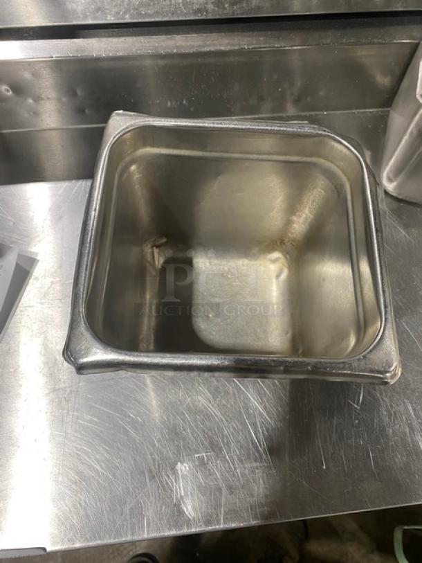 Commercial stainless steel steamtable pan, used, square shape, durable construction, ideal for hotel kitchens.