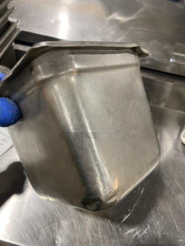 Stainless steel hotel steamtable pan, commercial-grade, used condition, visible wear and scratches, suitable for hospitality.