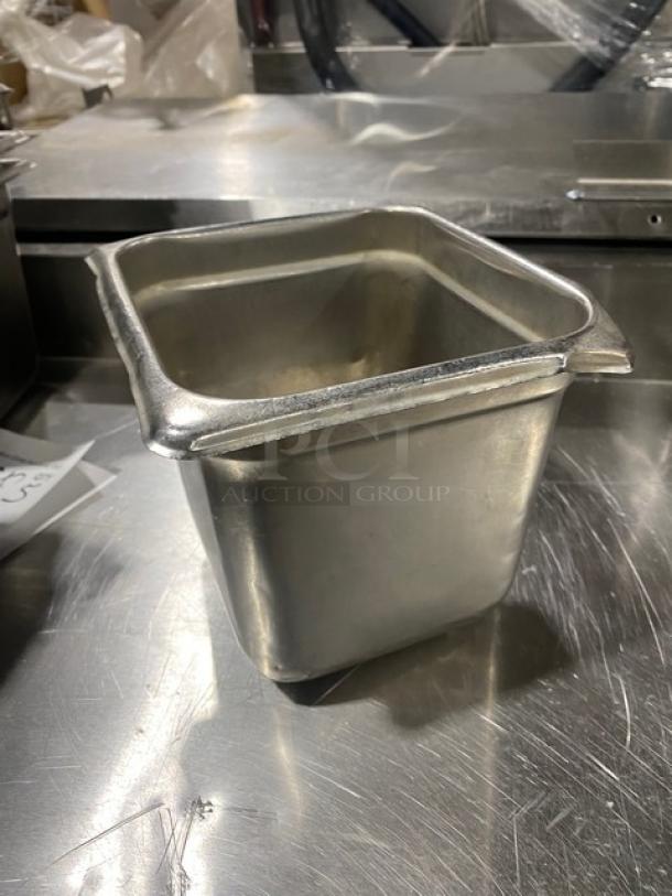 Commercial stainless steel steamtable pan, gently used, square shape, durable construction, ideal for hotel use.