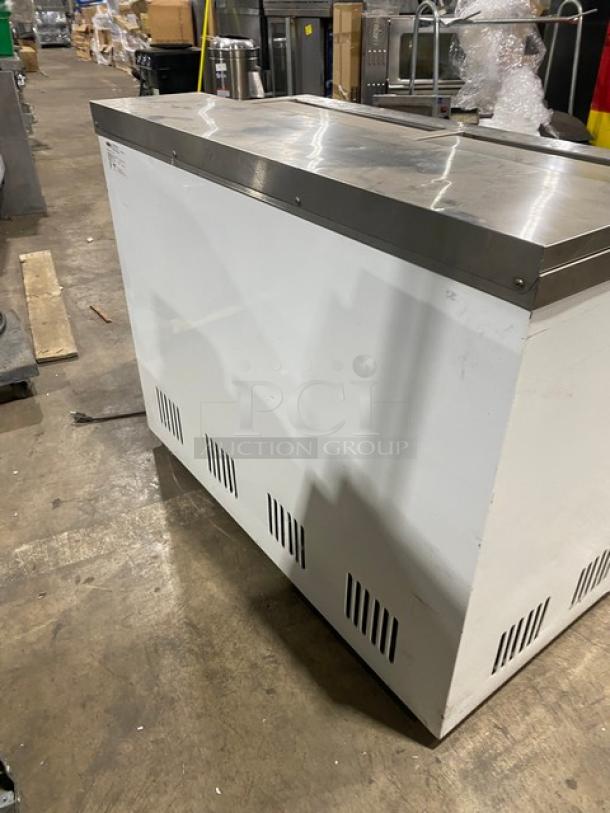 Summit SCFR100MAN 44" white chest cooler, manual defrost, stainless steel sliding lids, on legs, SN: 2017-03-1083.