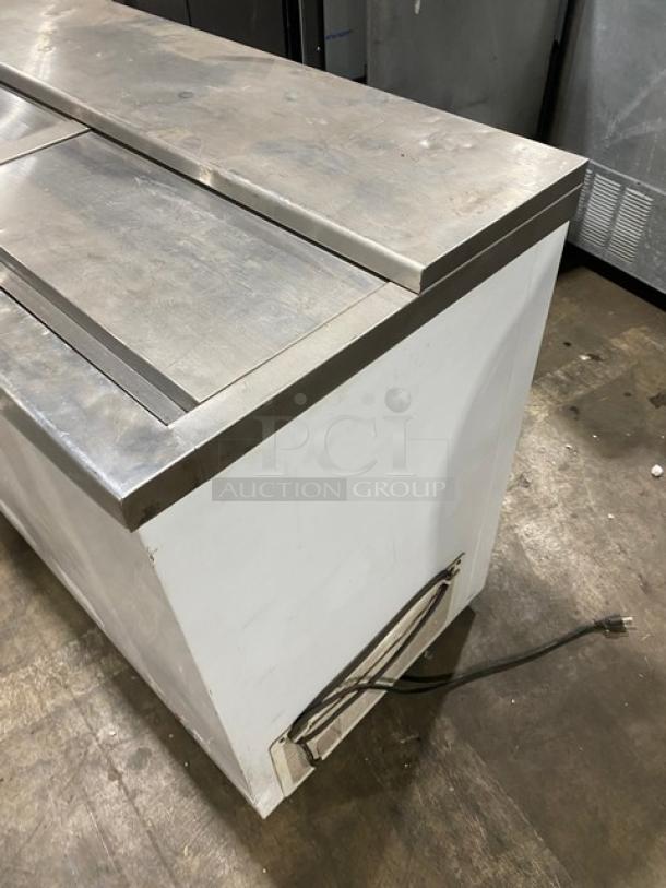 Summit Commercial 44" chest cooler, model SCFR100MAN, with manual defrost and stainless steel sliding lids.