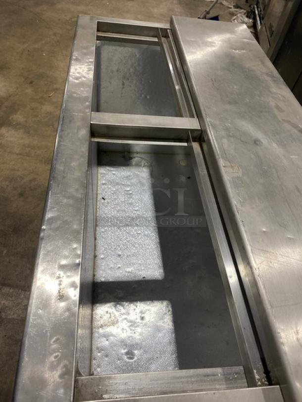 Summit SCFR100MAN 44" back bar chest cooler, manual defrost, stainless steel sliding lids, on legs, model SN 2017-03-1083.
