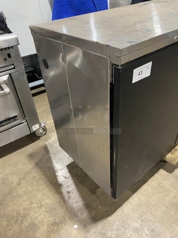 Perlick BS60 2 Door 60" back bar refrigerator, stainless steel with solid black doors, 115V, SN: 608090, in used condition.