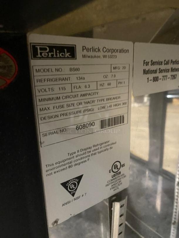 Perlick BS60 back bar refrigerator, stainless steel, 2-door, black doors, label shows Model: BS60, Serial: 608090, 115V 1 Phase.