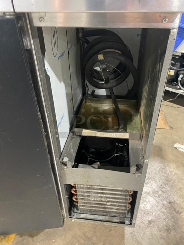 Perlick BS60 60" back bar refrigerator, stainless steel, black solid doors, commercial grade, interior view. SN: 608090.