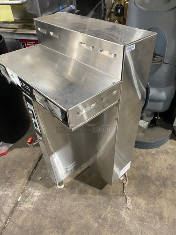 Fetco CBS-52H15 stainless steel twin coffee brewer with hot water dispenser, 240V, on legs, electric-powered, commercial use.