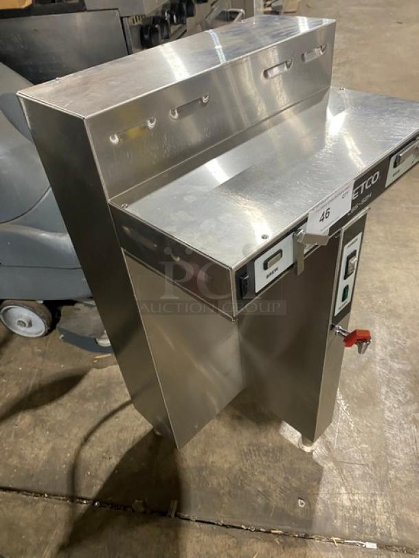 Fetco CBS-52H15 stainless steel twin coffee brewer with hot water dispenser, on legs, 240V, 1 Phase.