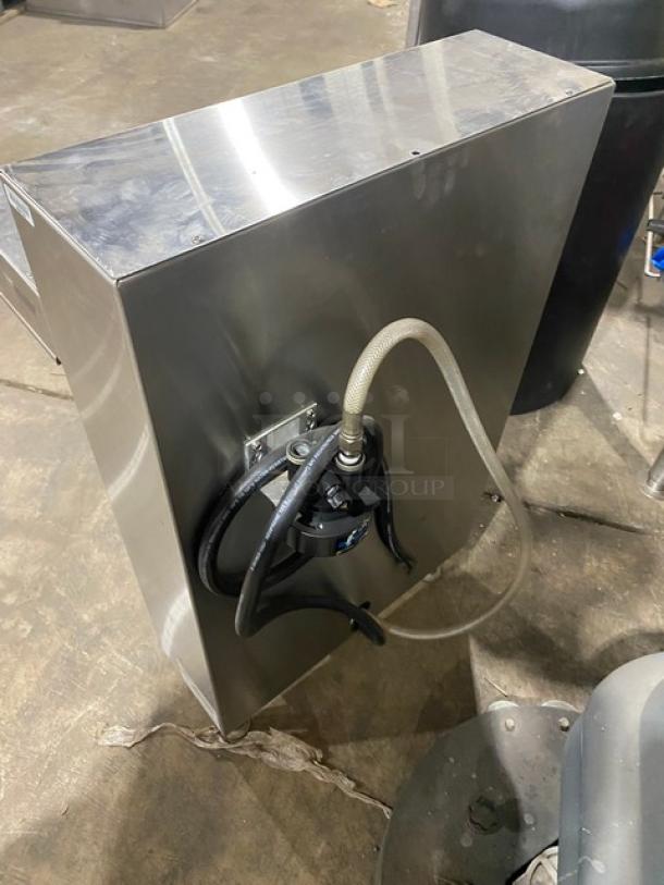 Fetco CBS-52H15 stainless steel twin coffee brewer with hot water dispenser, 240V 1 Phase, on legs, in fair condition.