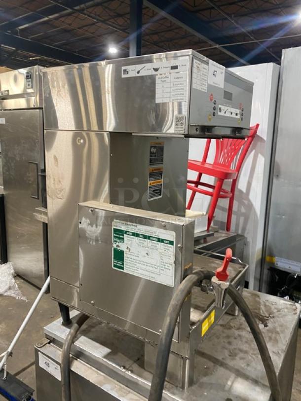 Bunn commercial stainless steel dual coffee brewer, model DUALSHDBC, with digital control and hot water dispenser.