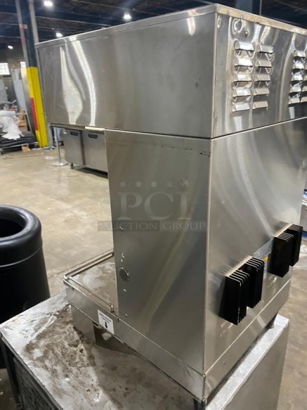 Bunn DualSHDBC commercial stainless steel coffee brewer with hot water dispenser, digital controls, and countertop design.