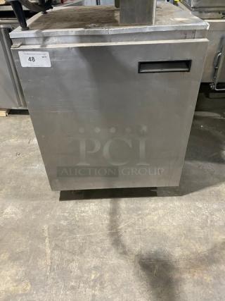 Commercial stainless steel single door undercounter refrigerator on casters, with poly-coated wired rack. Slight wear visible.
