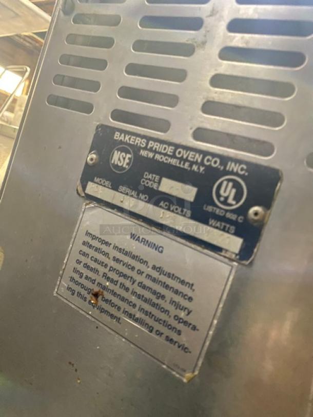 Bakers Pride Model P18 stainless steel electric countertop pizza oven with label showing NSF and UL certifications.