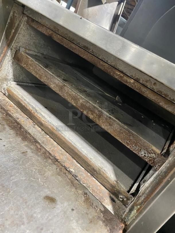 Bakers Pride P18 stainless steel electric countertop pizza oven, single chamber, double deck, visible rust and wear, commercial use.