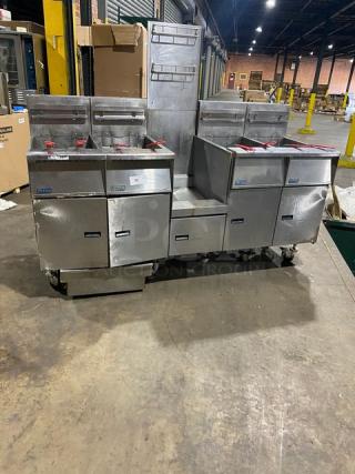 Pitco Five-Guys Style Commercial Stainless Steel Natural Gas Powered 4-Bay 50 Lb. Deep Fat Fryer System! With Center Basket Hanger Station! With Back Splash & Basket Hangers! With Fry Basket & Oil Filter! Model: FG-SGH50 SN: G13JE049284! 115V! On Casters! - Item #1212411