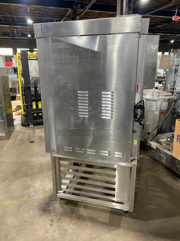 Baxter OV300G stainless steel gas convection oven with digital control, 8-pan rotating rack, and open-base pan holder on casters.