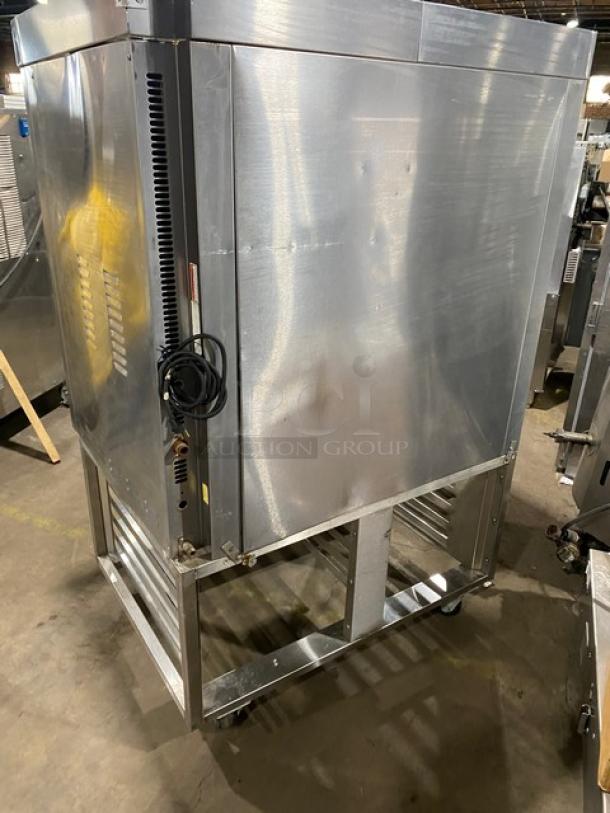 Baxter OV300G commercial stainless steel convection oven with digital control; natural gas, 8-pan rotating rack, base on casters.