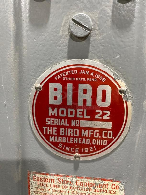 Biro Model 22 meat saw label showing "Serial No: 2216727." Red and white markings from Biro Mfg. Co., Marblehead, Ohio.