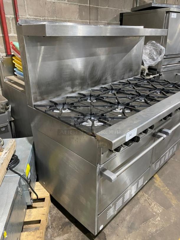 Garland H284 stainless steel commercial 10-burner range with double oven, backsplash, salamander shelf, on legs. Natural gas.