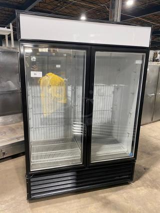 True commercial double glass door freezer, model GDM-49F-LD. Black frame, poly coated wired racks, Energy Star certified.