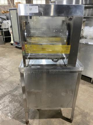 Prince Castle Model 413 stainless steel corn carousel with double undershelf cart, 115V, on casters, in used condition.