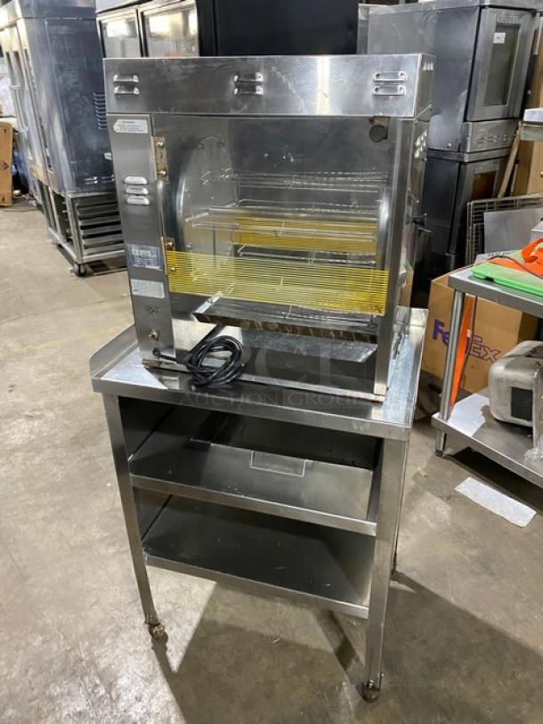 Prince Castle Model 413 stainless steel electric corn carousel with double undershelf cart, on casters, 115V, SN: 102.