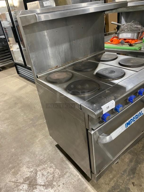 Imperial stainless steel 6-burner electric range/oven combo with backsplash, overhead salamander shelf, and wired oven rack.