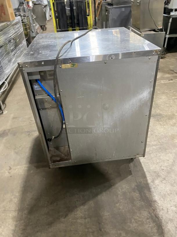 Moffat stainless steel undercounter convection oven, electric, single stack, built-in pan slides, 115-120V, on casters.