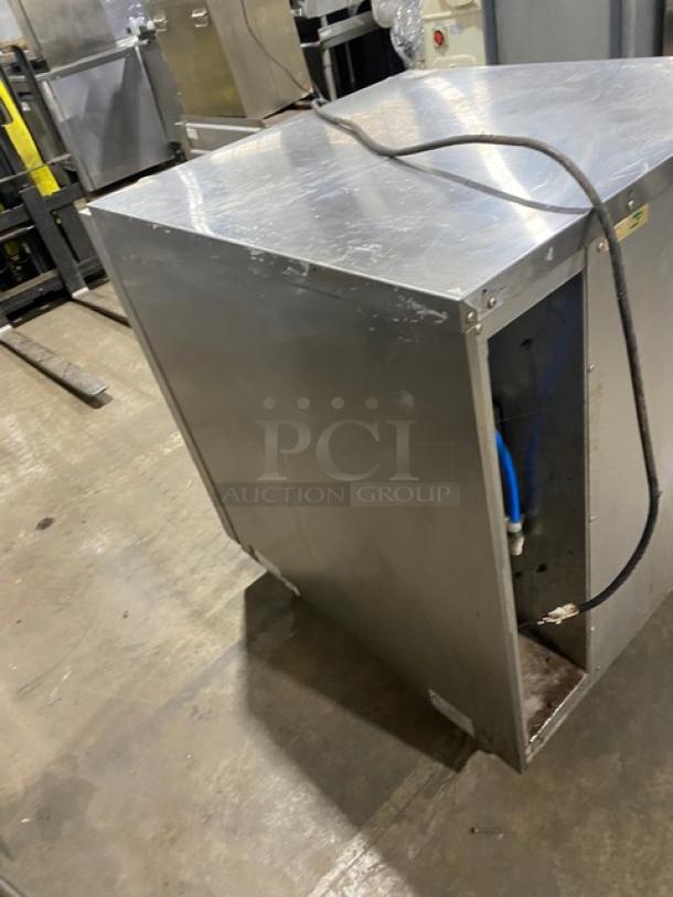 Moffat commercial stainless steel undercounter convection oven on casters, electric-powered, with built-in pan slides.