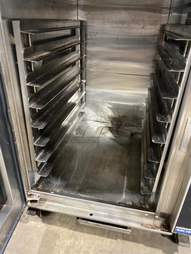 Moffat stainless steel convection oven, single stack, undercounter, with built-in pan slides. Electric, 115-120V, on casters.