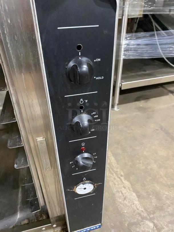 Moffat stainless steel electric convection oven on casters, 115-120V, with built-in pan slides and control knobs.