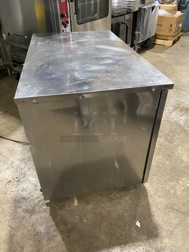Delfield UC4048STAR stainless steel 2-door refrigerated worktop table, Energy Star certified, on casters, excellent condition.