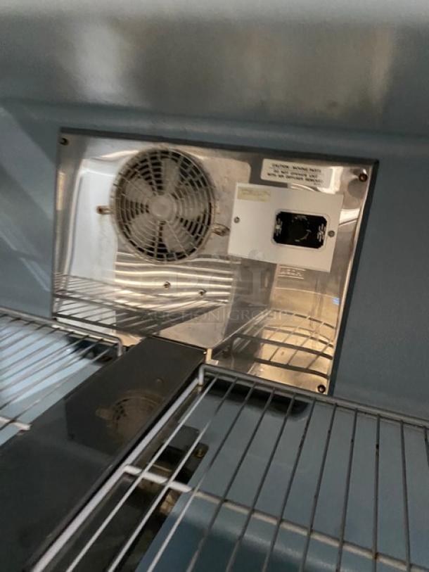 Delfield UC4048-STAR 2-door stainless steel refrigerated worktop, Energy Star certified, featuring poly-coated wired rack.