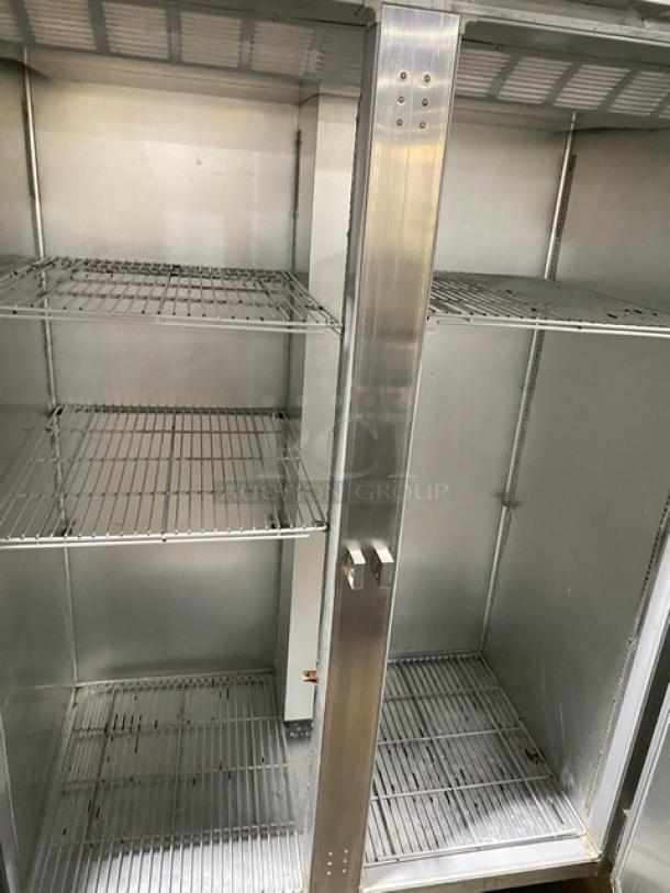 Beverage-Air E-Series stainless steel 2-door reach-in refrigerator with poly-coated wired rack, model ER481AS, on casters.