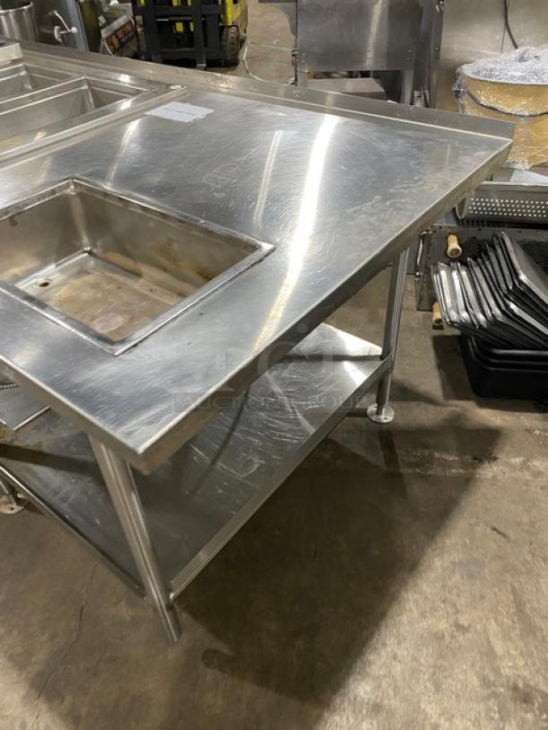 Custom commercial stainless steel food prep table with a single hot well and four cold wells, adapter plates, undershelf, on legs.