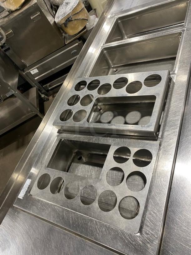 Custom commercial stainless steel food prep table with single hot well, four cold wells, adapter plates, and undershelf.
