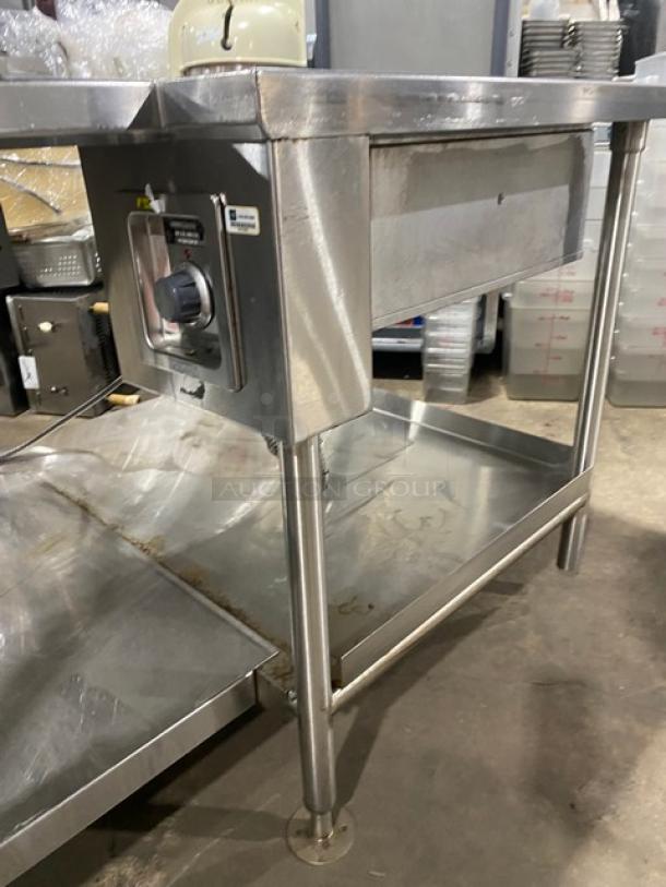 Custom commercial stainless steel prep table with single hot and four cold wells, adapter plates, and undershelf, on legs.