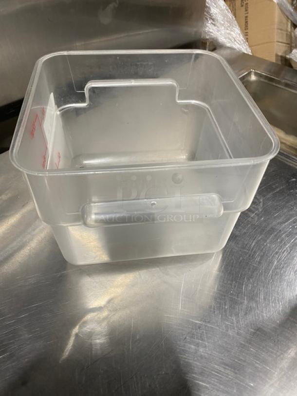 Cambro clear polycarbonate 12 Qt. food container, commercial-grade, rectangular shape, stackable, slight wear visible.