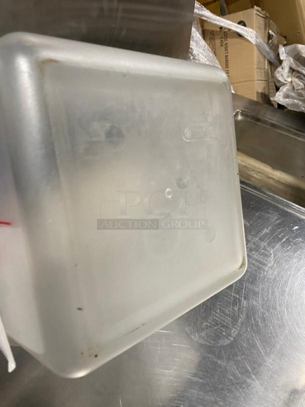 Cambro commercial clear polycarbonate 12 qt. food container, durable condition, prominent marking, ideal for kitchen use.