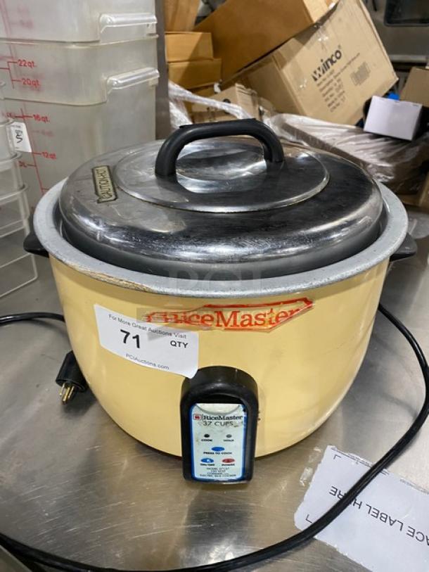 Town Electric Rice Cooker 37-Cup, Model 57137. Yellow exterior, stainless lid, label indicates RiceMaster brand.