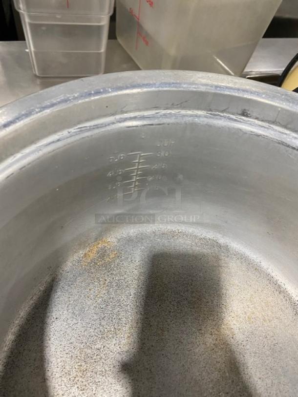 Town 37-cup countertop rice cooker, model 57137, with lid. Markings indicate cup measurements inside. Used condition.