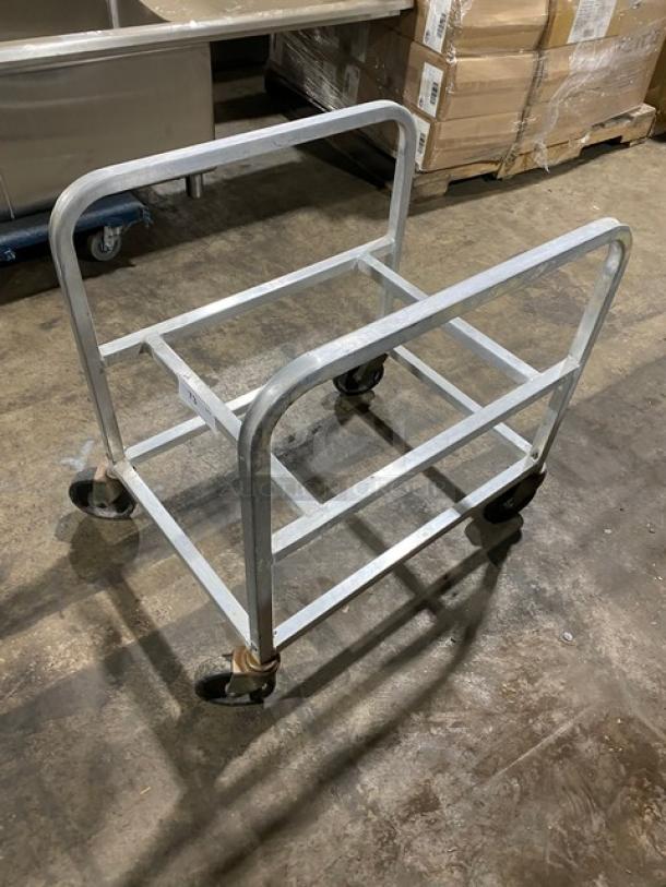 Commercial heavy-duty bulk mover utility cart on casters, metal frame, lightly used, ideal for industrial transport tasks.