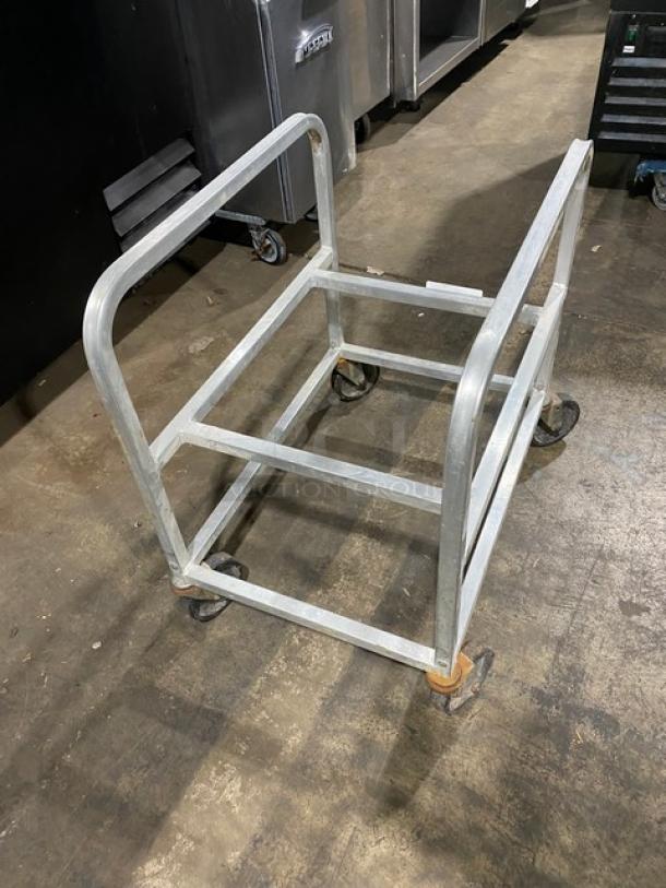 Commercial heavy-duty bulk mover utility cart on casters, metal frame, used condition, ideal for transporting large items.