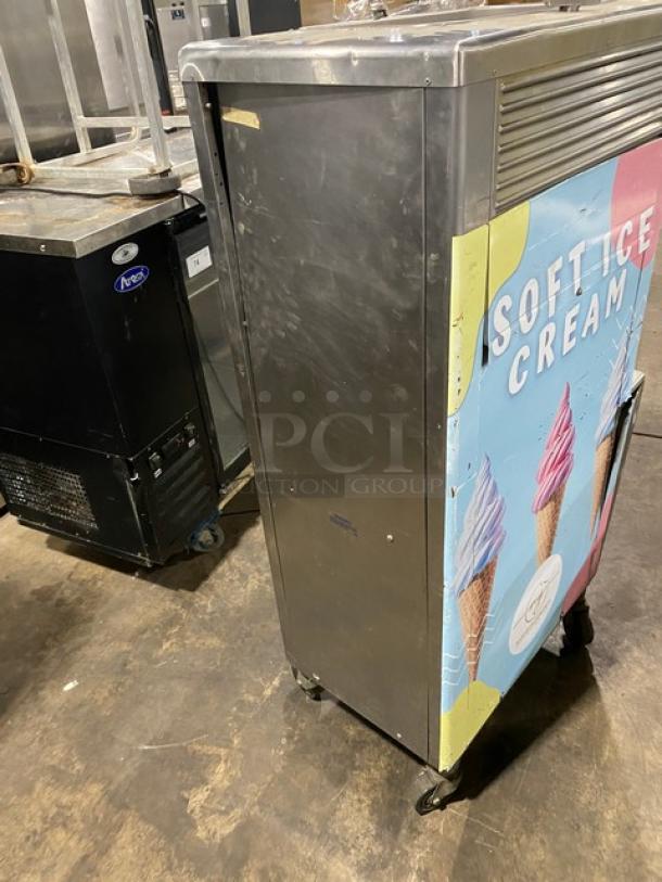 Taylor Softech Y751-27 single flavor soft serve machine, stainless steel, on casters, 208/230V, commercial use.