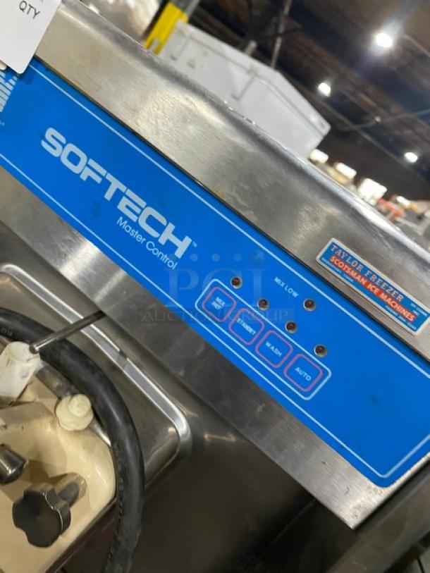 Taylor Y751-27 Softech commercial soft serve machine, stainless steel, single flavor, electric, with control panel, on casters.