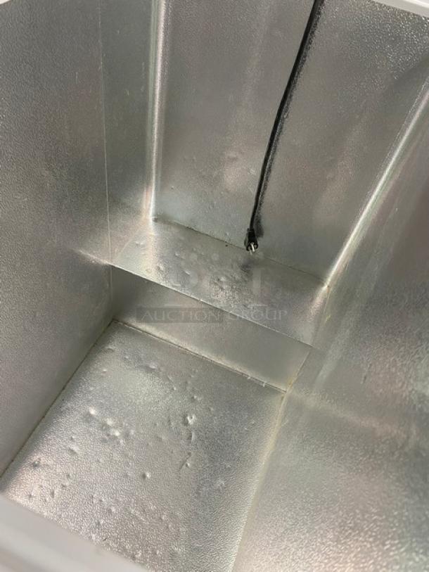 Hisense Commercial Chest Freezer, Model WCF070M6RWD, interior view. Clean condition, standard 115V.
