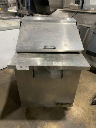 True Commercial Stainless Steel Prep Table, Model TSSU-27-12M-B, on casters, used condition, for sandwiches and salads.