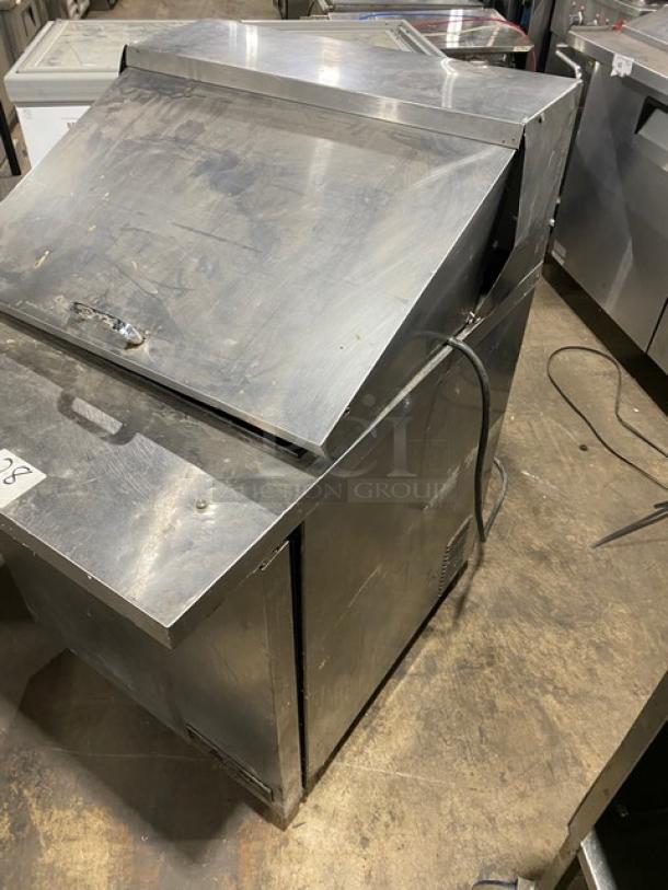 True TSSU-27-12M-B refrigerated prep table, stainless steel, single door. Includes Bain Marie top. On casters. 115V, 1 phase.